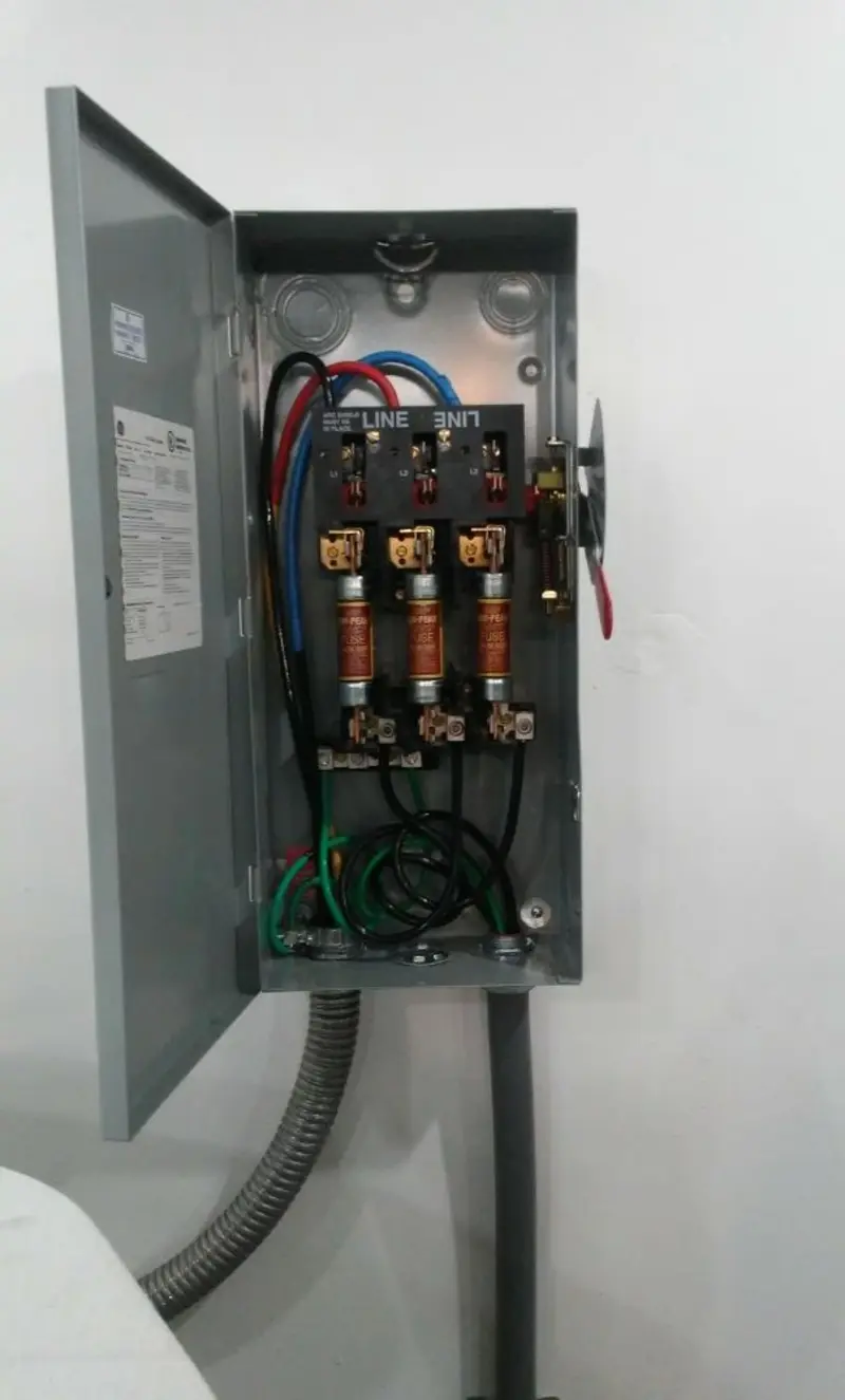 Three-phase disconnect switch installed for Smoke Detector Installation in Moody